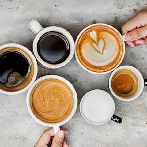 overhead image of coffee cups with different espresso-based drinks