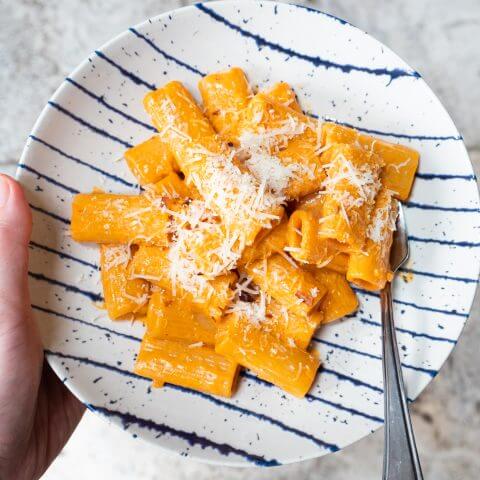 pasta on a plate striped plate