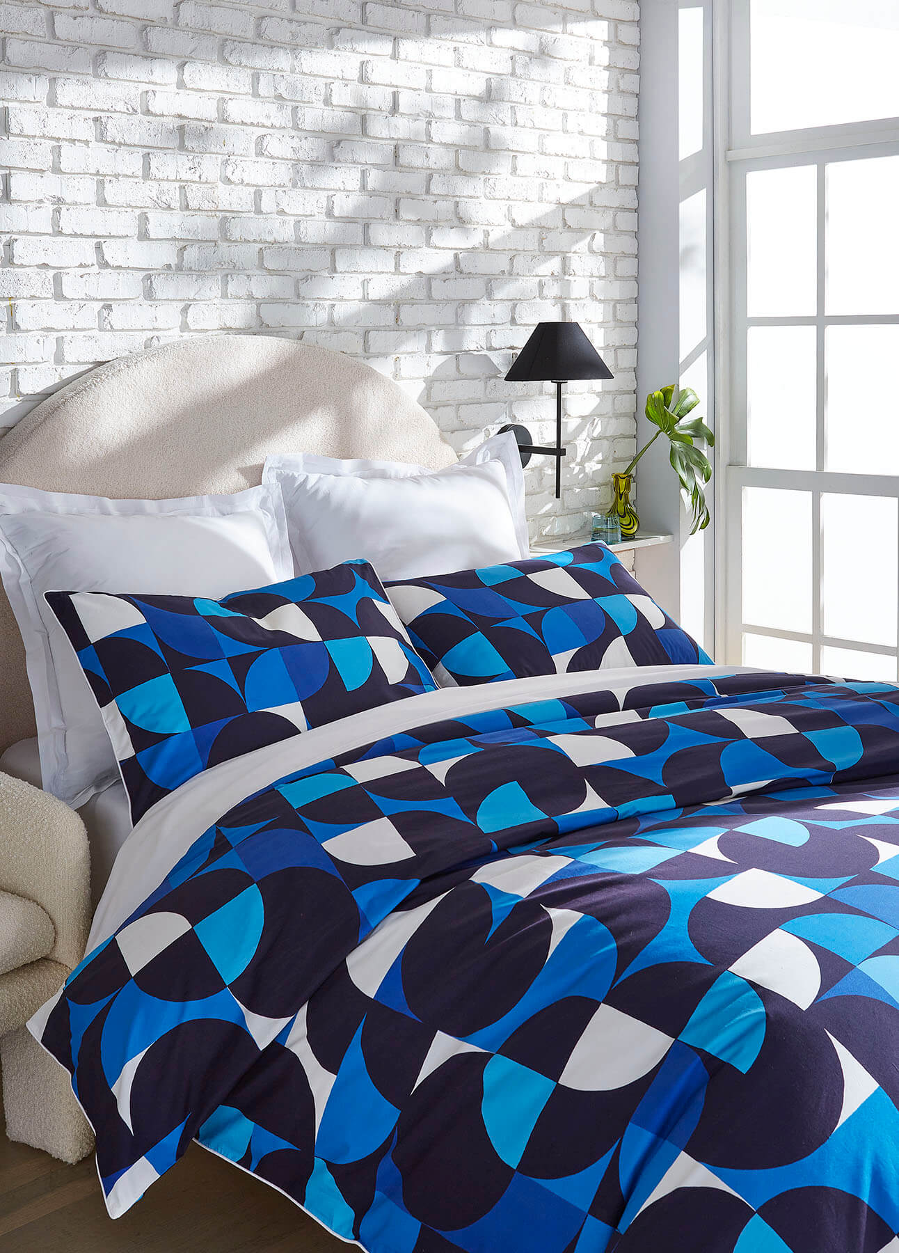 bed in room with window