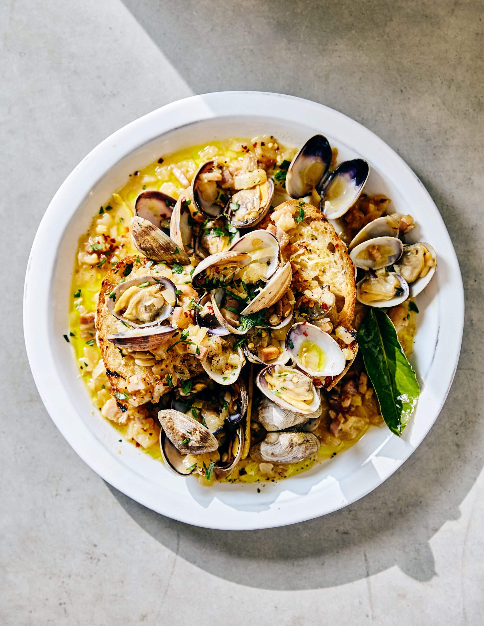 clams and toast on dish