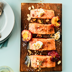 pieces of salmon on a cedar plank