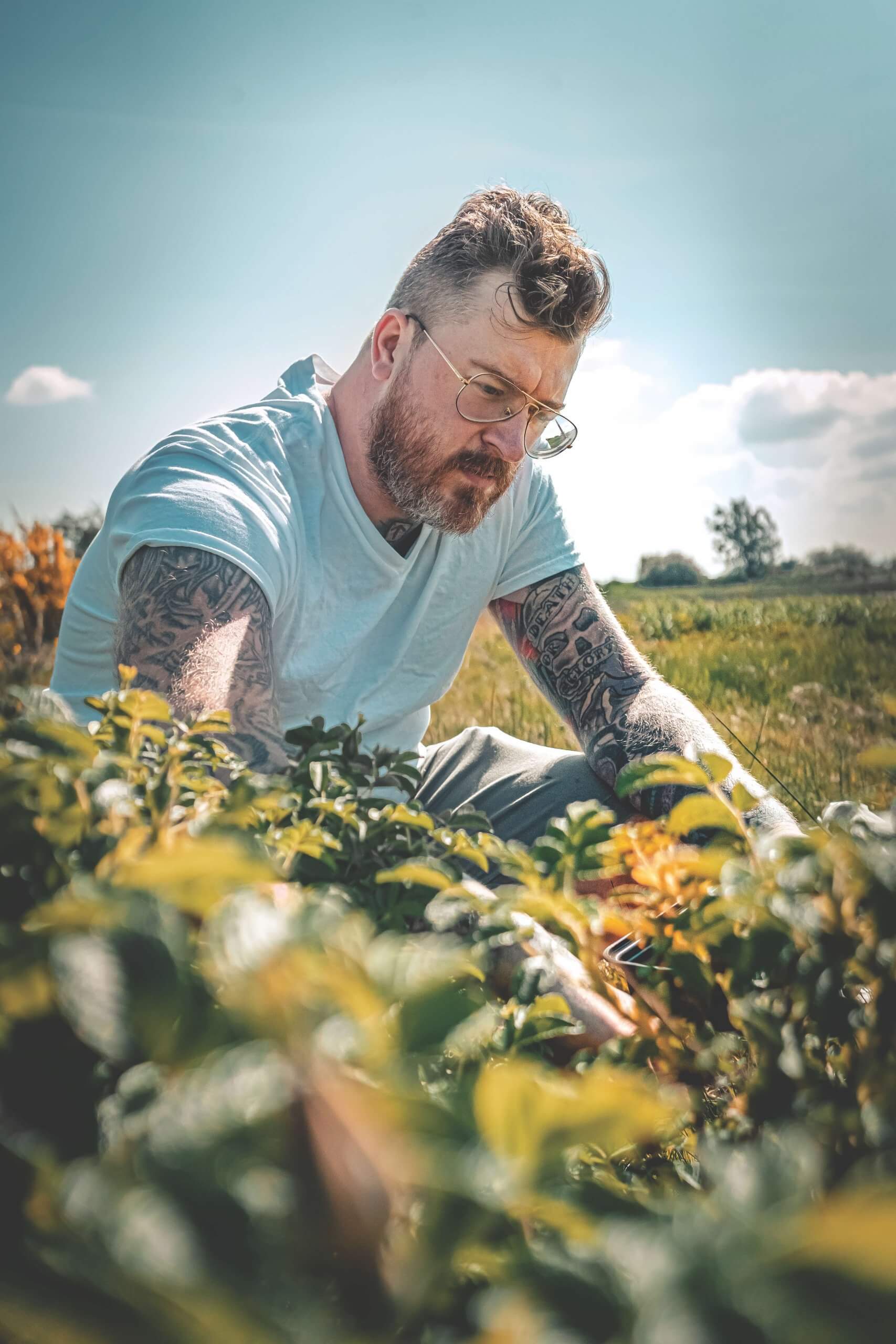 photo of man in field