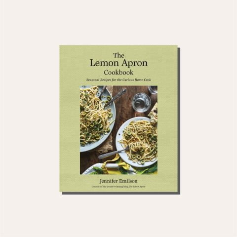 Jennifer Emilson's the Lemon Apron cookbook, A green cookbook on a cream background