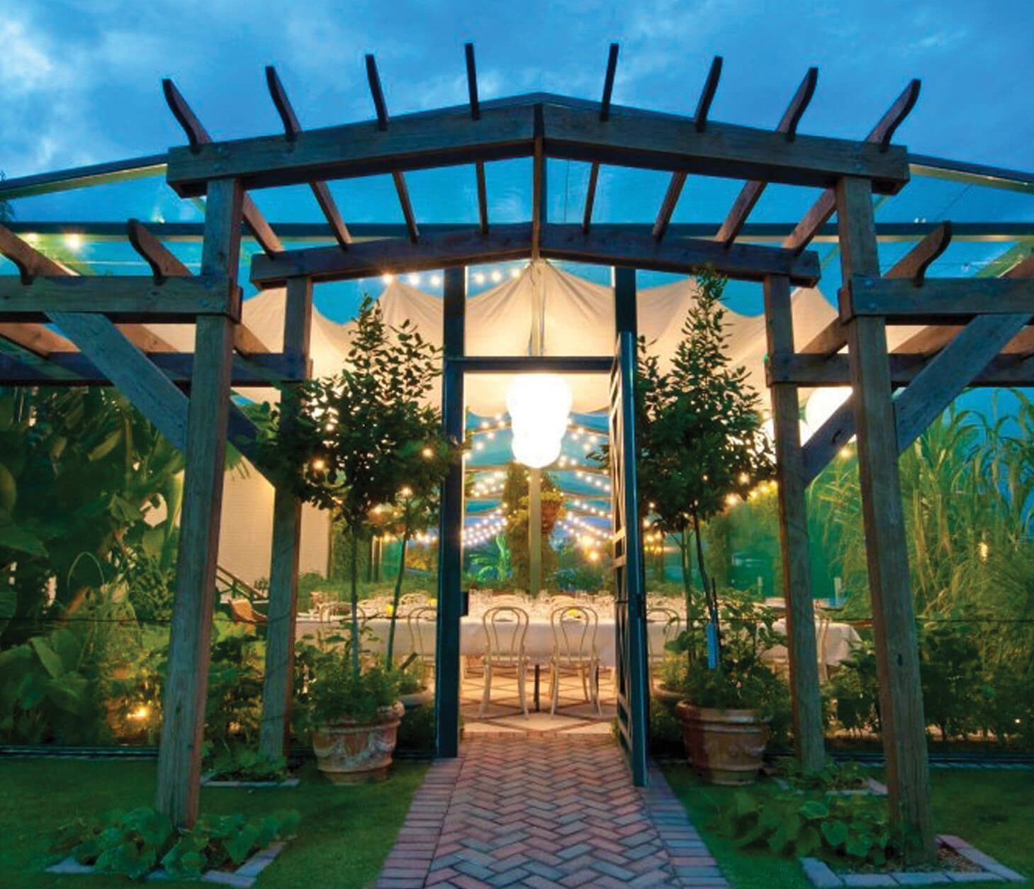 Outdoor pergola with chairs