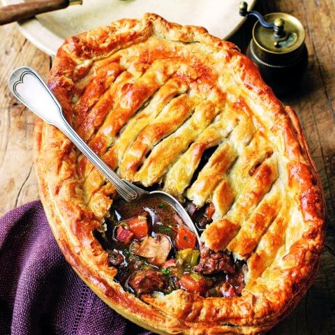 oval pie with spoon