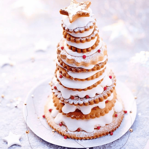 A tower made of frosted Christmas cookies