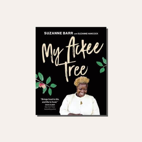 Suzanne Barr's "My Ackee Tree" cookbook cover in a light frame.