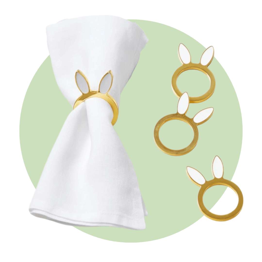 white napkin and napkin rings on green dot