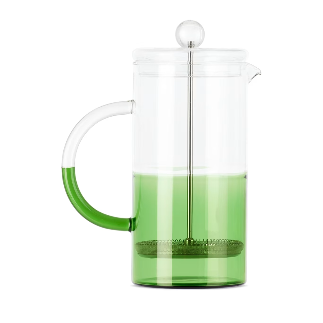 Two tone clear and green glass french press. 