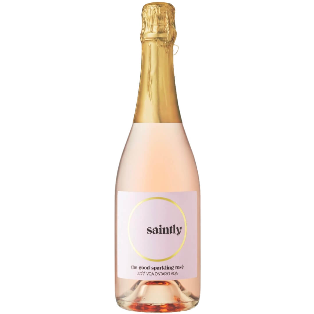A bottle of light rosé qine with gold foil and a simplistic label