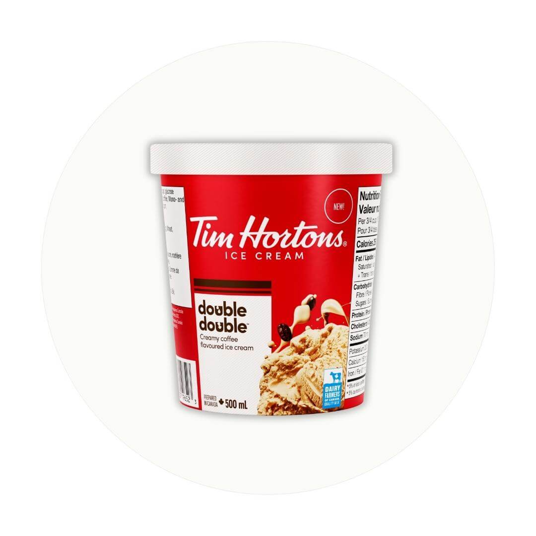 A carton of ice cream with a red label on an off-white circle