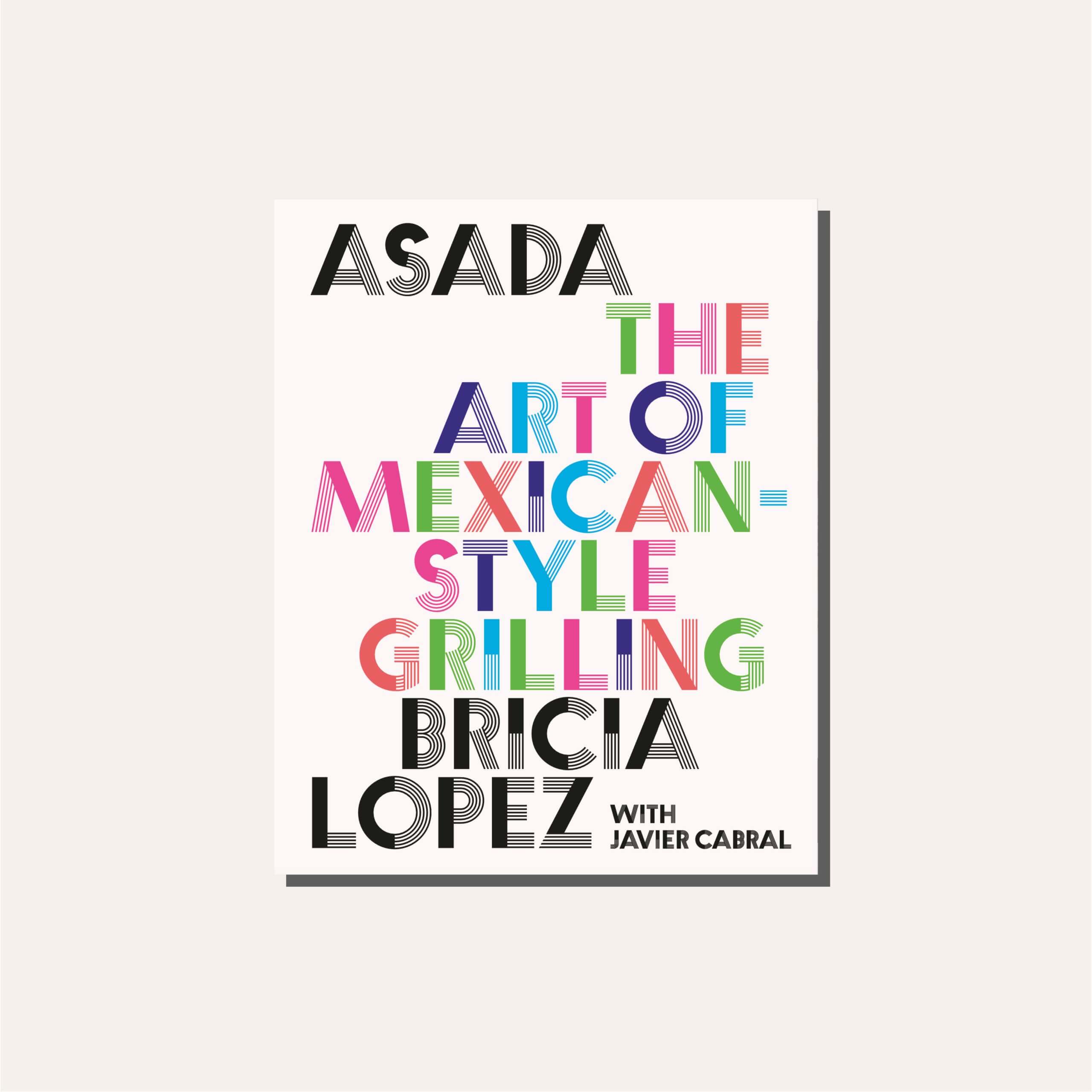 A white book cover with black and multicoloured lettering in a tan frame