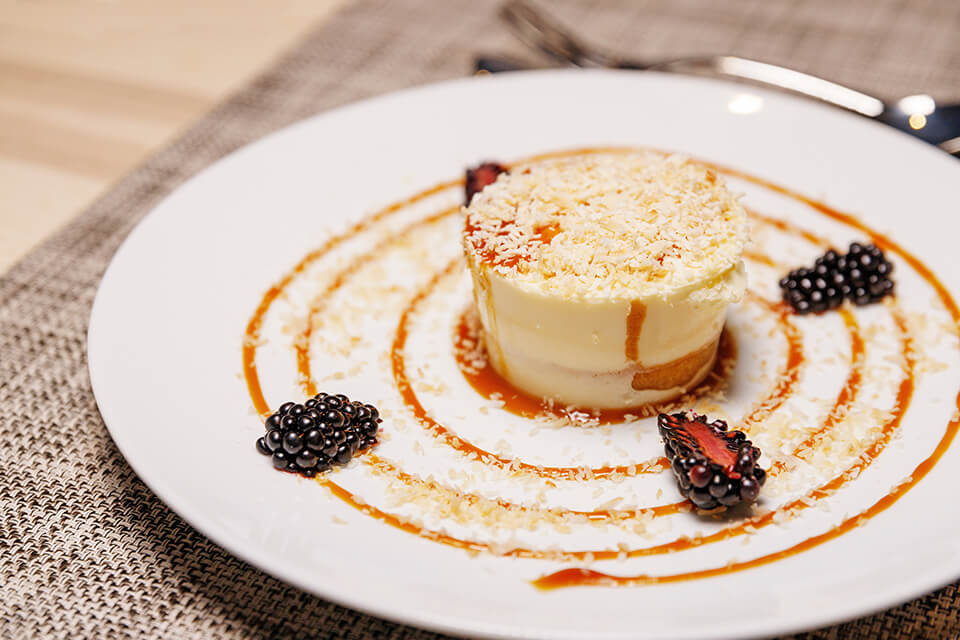plate with dessert and caramel swirl