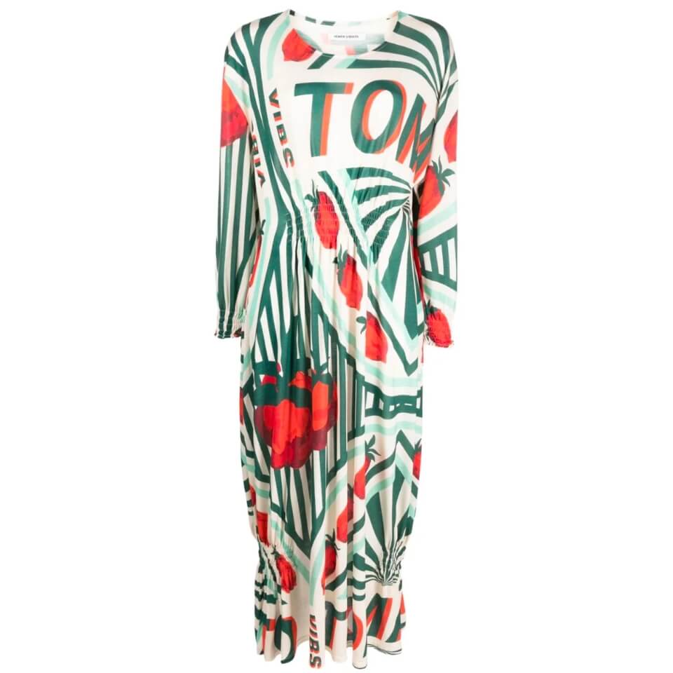 A white dress with a green and red tomato design