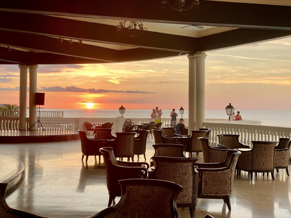 A dining patio at sunset