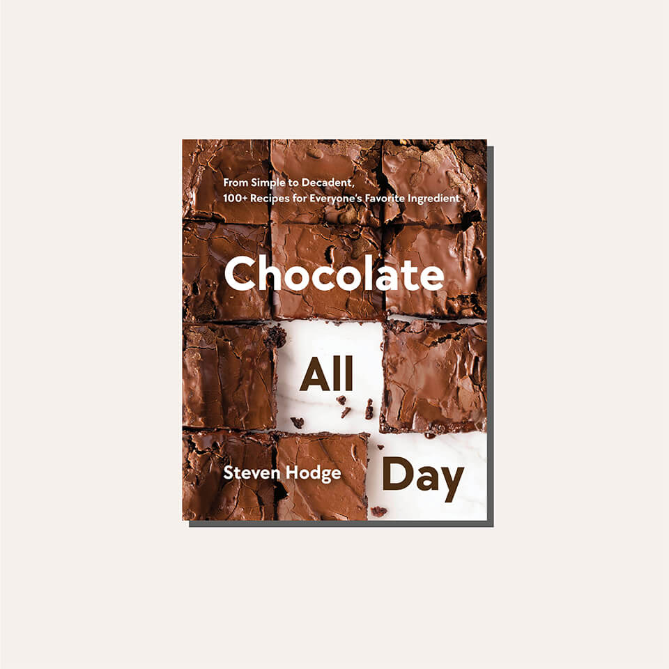 A cookbook cover in a light frame