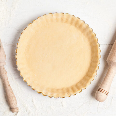 classic pie dough recipe by Anna Olson ready for baking.