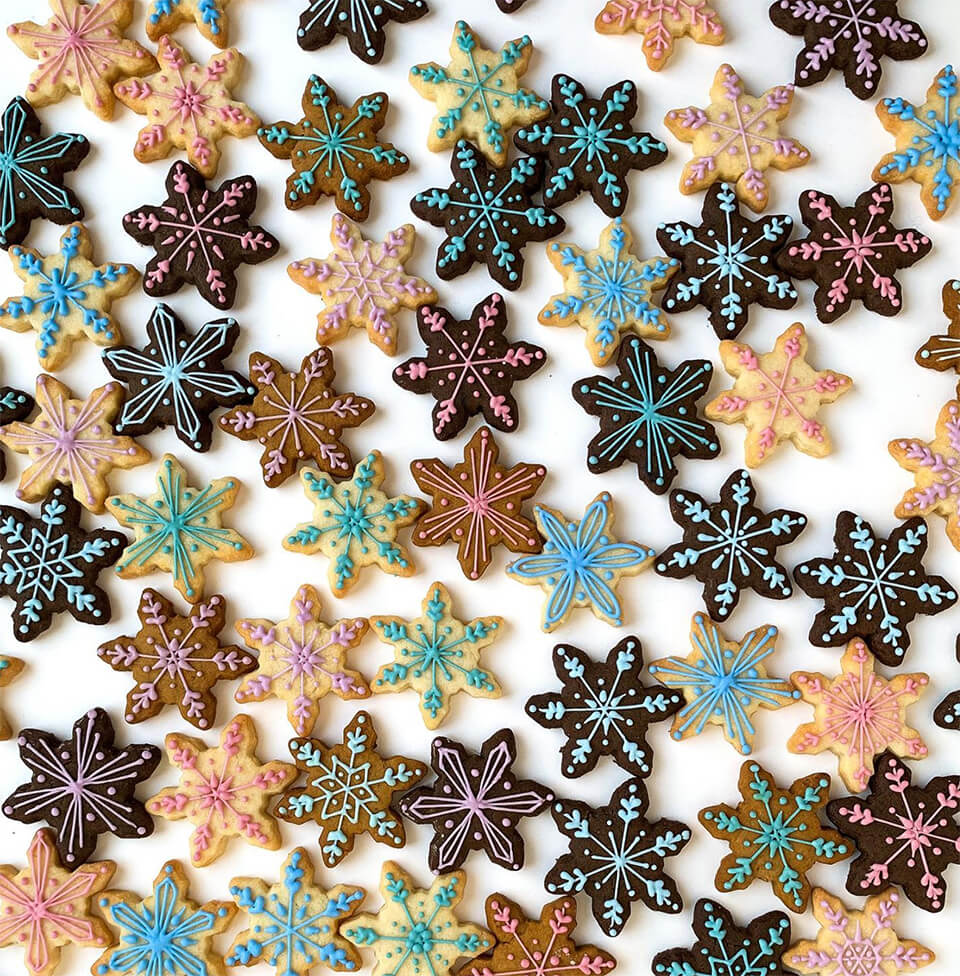 Snowflake-shaped cookies in various flavours