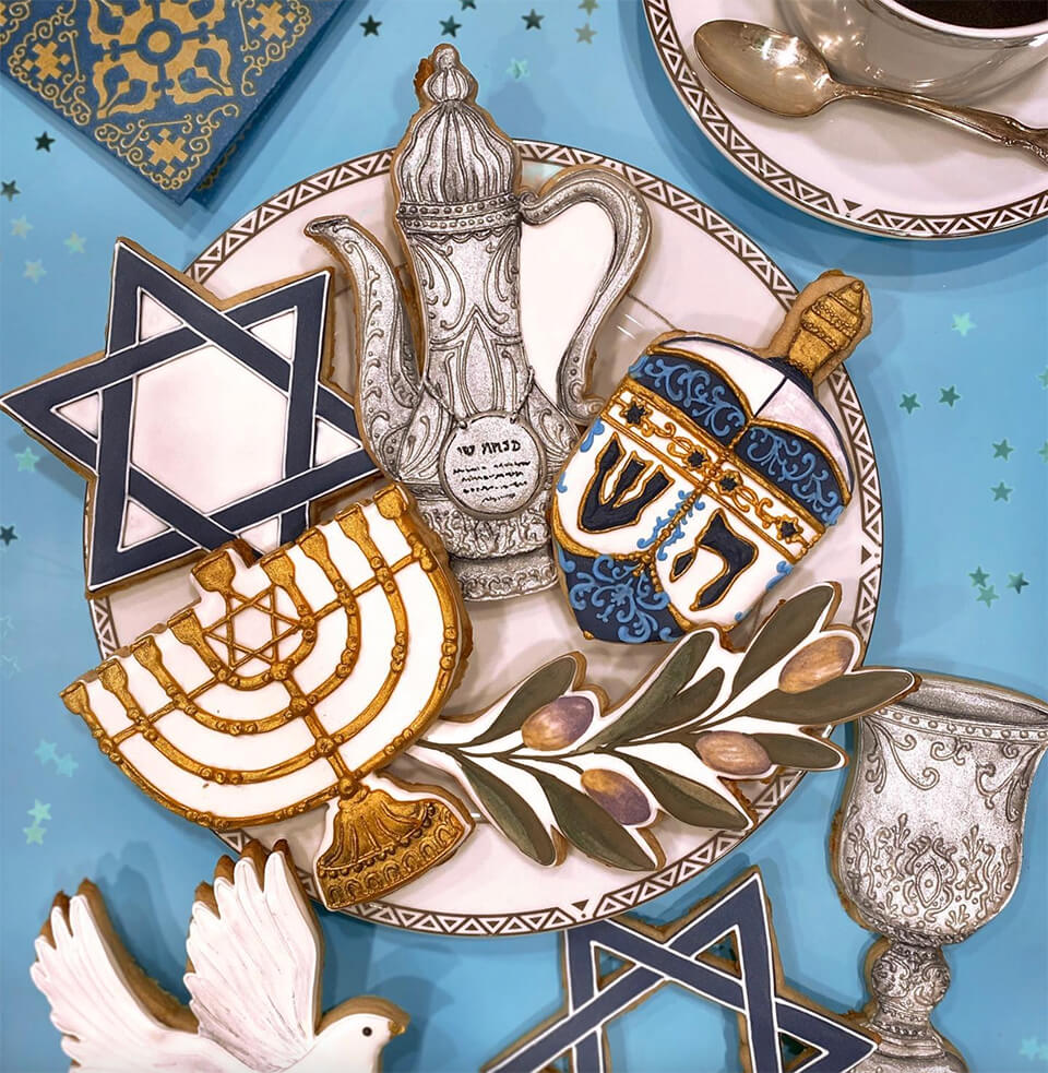 Cookies frosted in various Hanukkah patterns