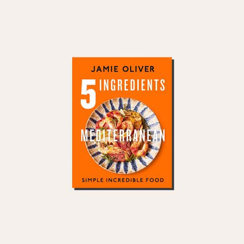 An orange book cover in a light tan frame.