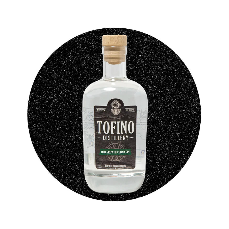 A bottle of gin with a black label in a sparkly black circle