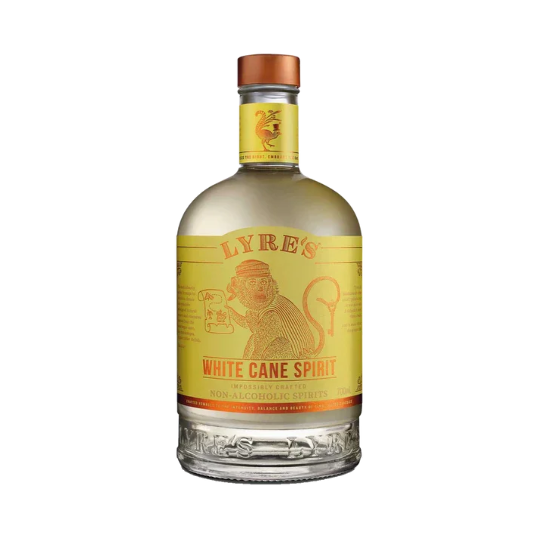 Clear bottle of non-alcoholic rum alternative with a yellow label. 