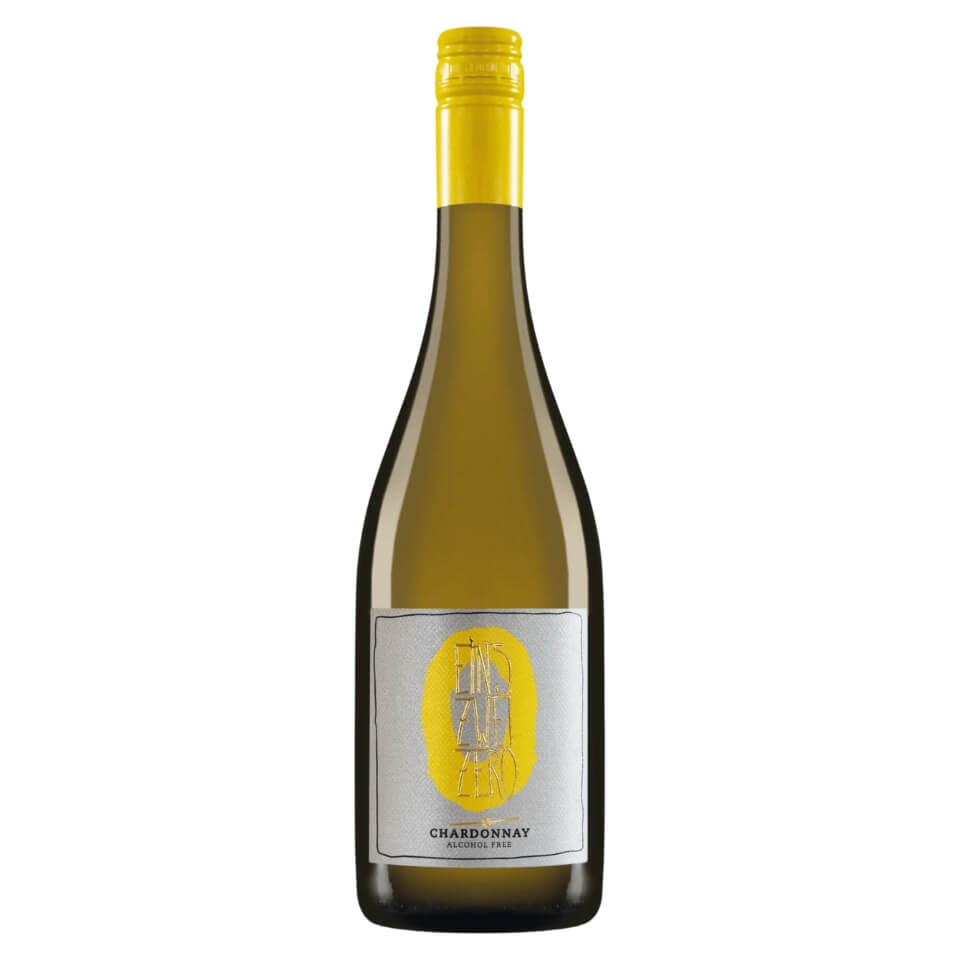 A bottle of white wine with a yellow cap