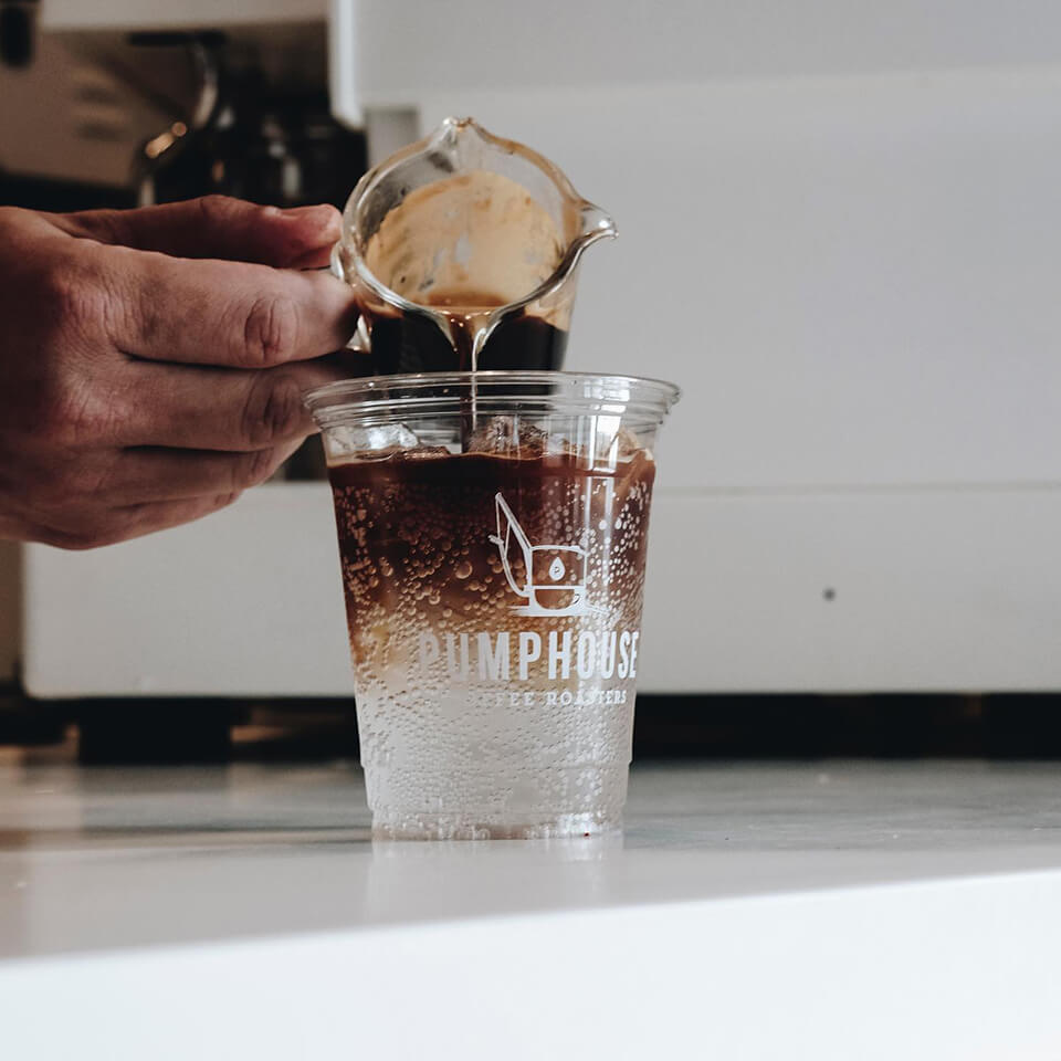 A person's hard pouring coffee