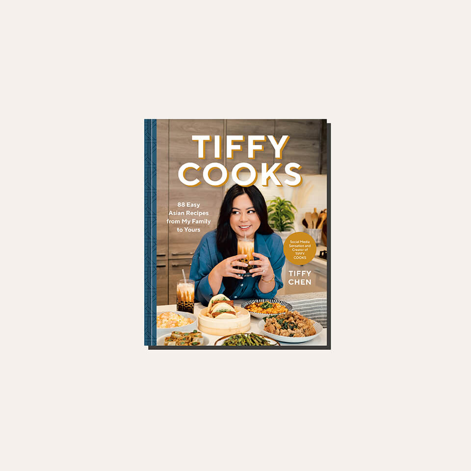 A book cover in a light tan frame