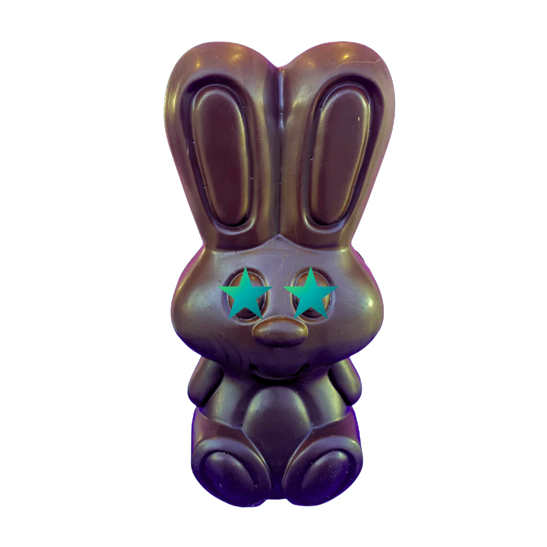 A cartoonish chocolate Easter bunny with green stars on the eyes.