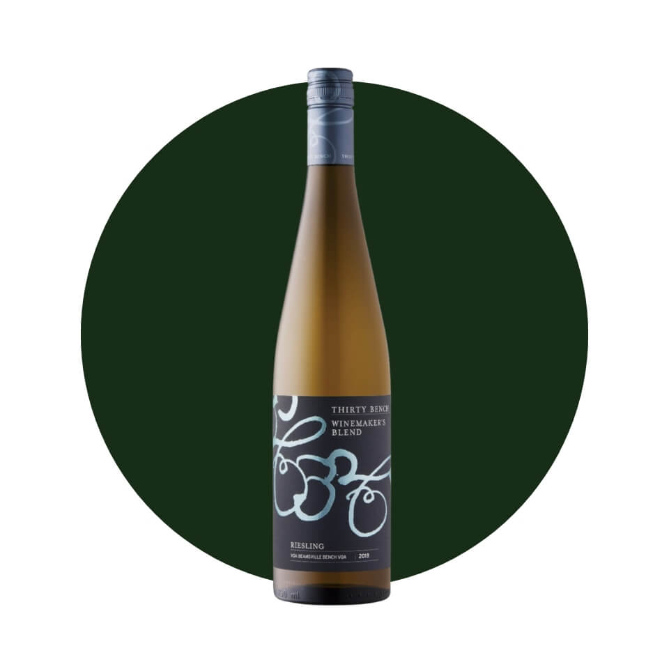 A bottle of wine over a dark green circle