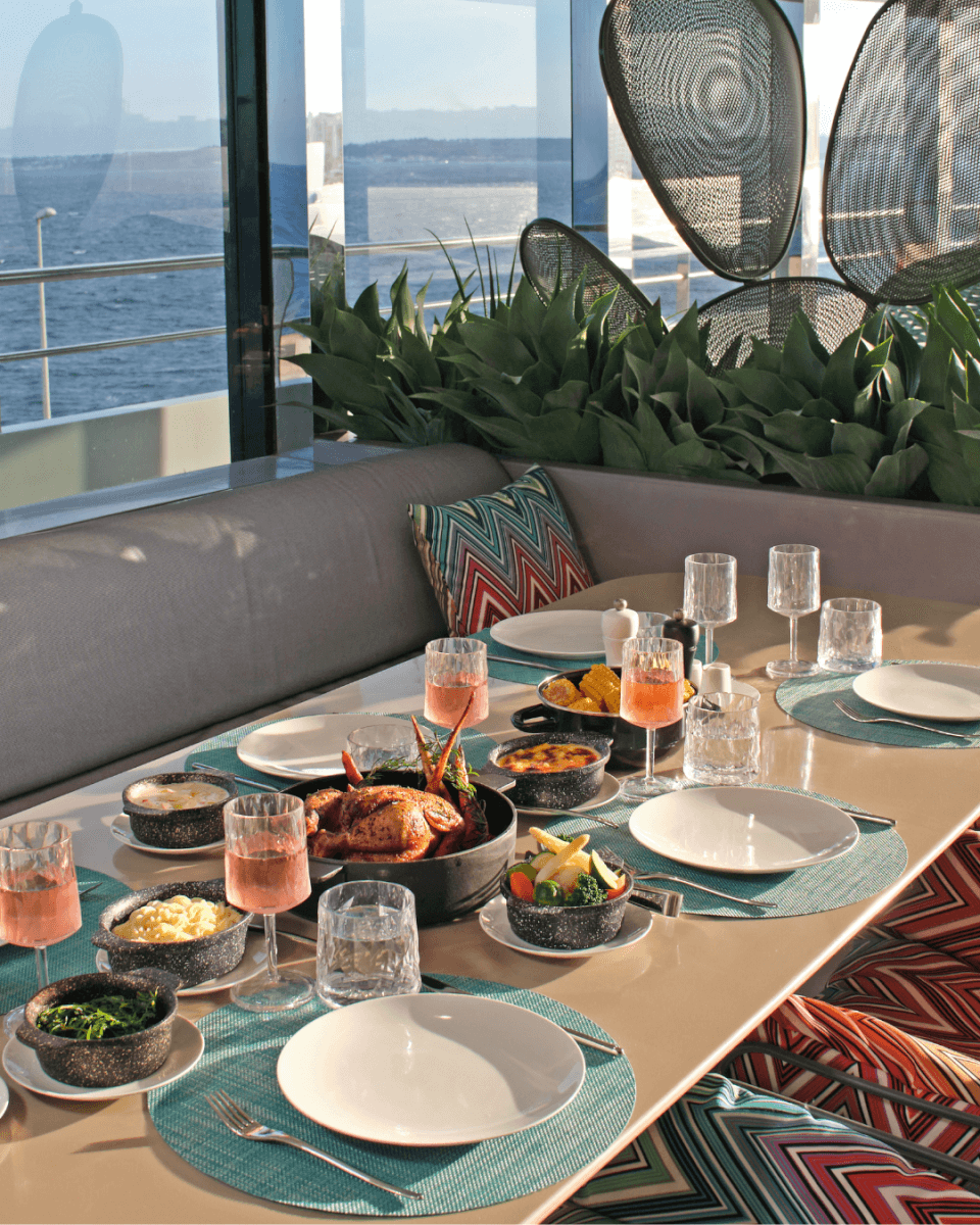 Outdoor dining table at sunset with meal
