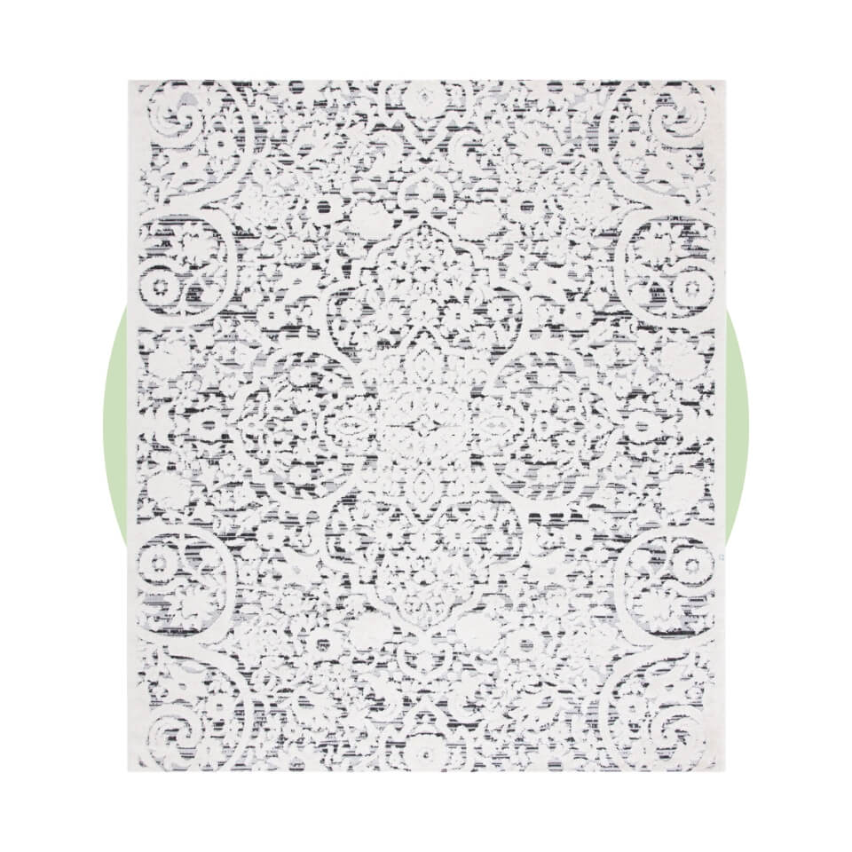 A white rug over a light green circle