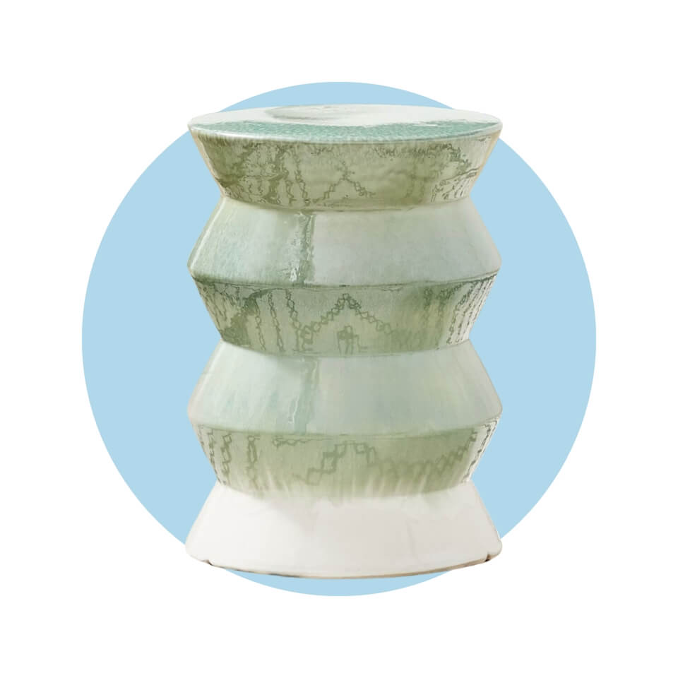 A green and white table over a light blue circle