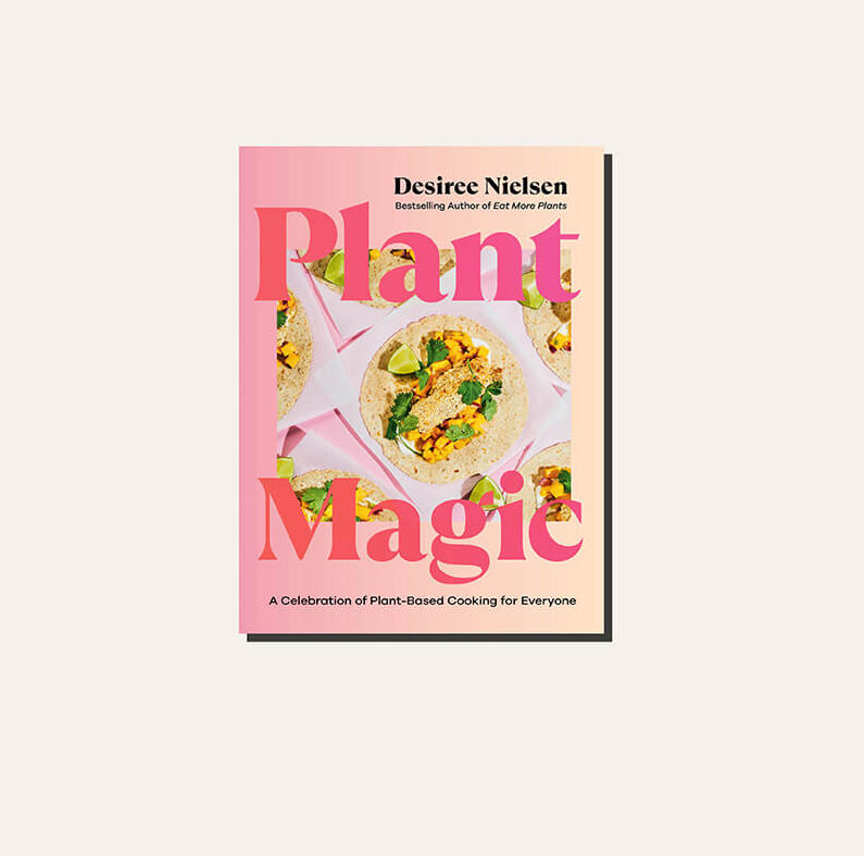 A book cover in a light frame is Plant Magic by Canadian Desiree Nielsen