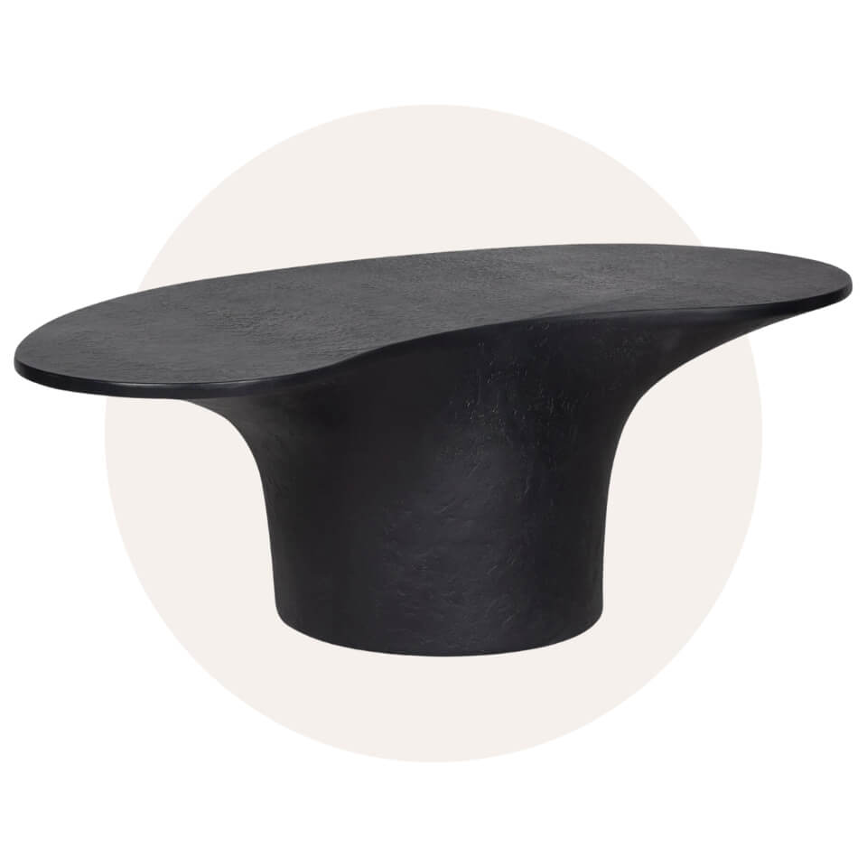 A black table over a cream-coloured circle