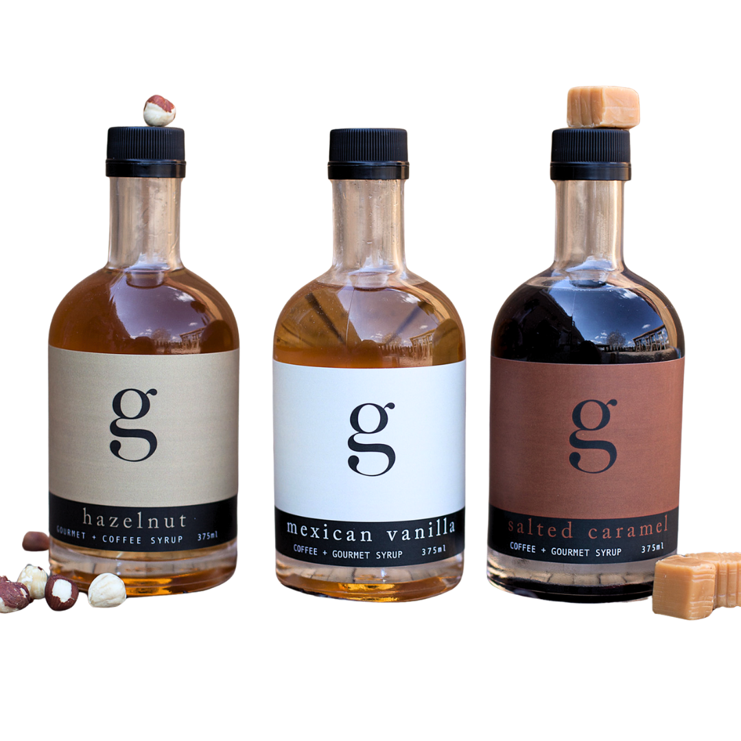 Three bottles of coffee syrup.