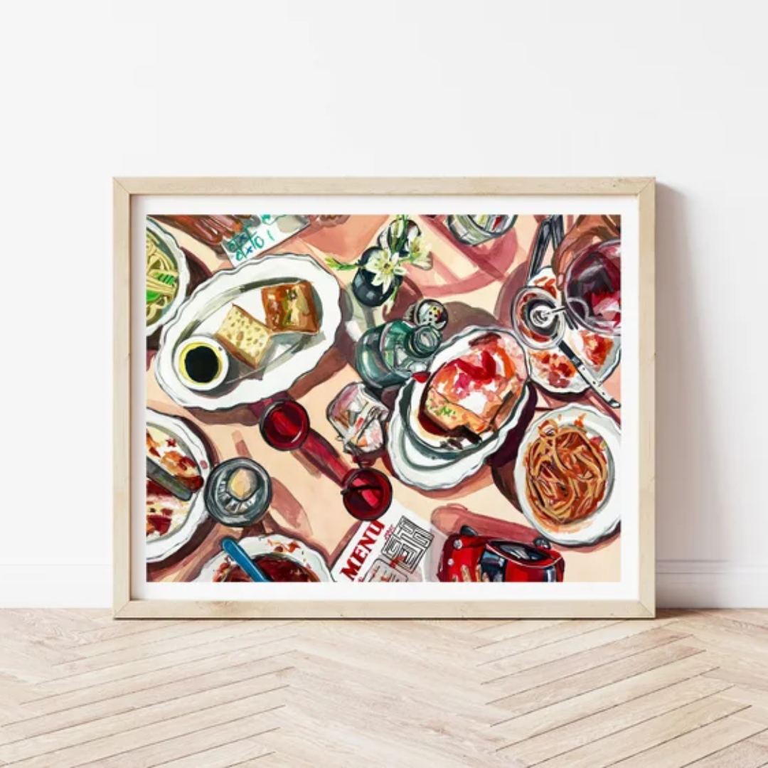 A framed gouache painting of a tablescape. 