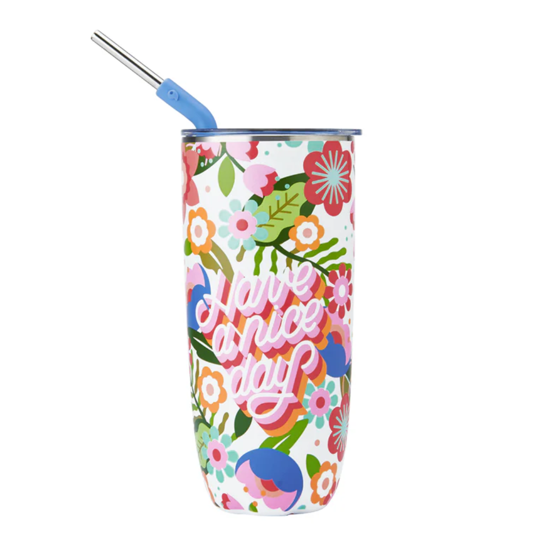 Colourful floral-patterned tumbler with silver straw. 