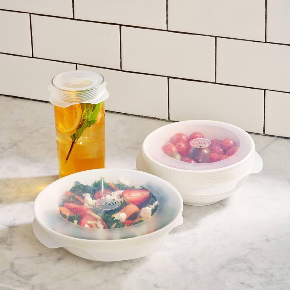 three containers with reusable stretch lids