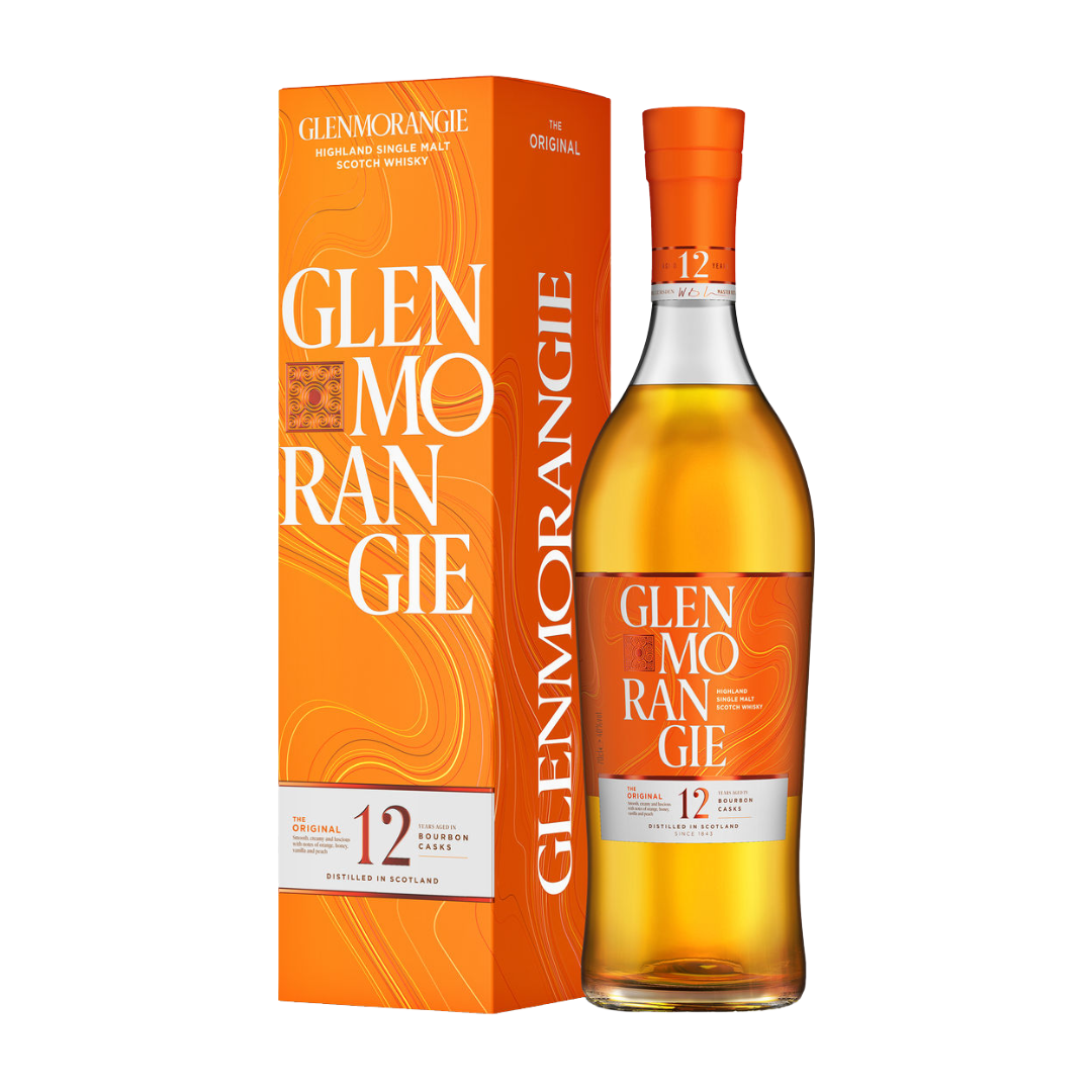 Orange bottle of whisky next to an orange box. 