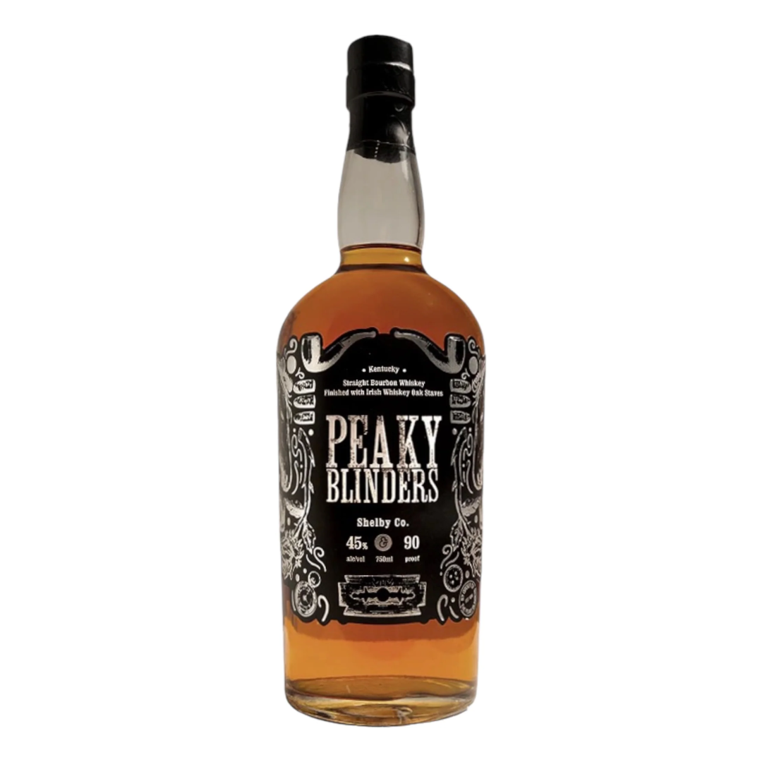 Bottle of whiskey with a black cap and label.