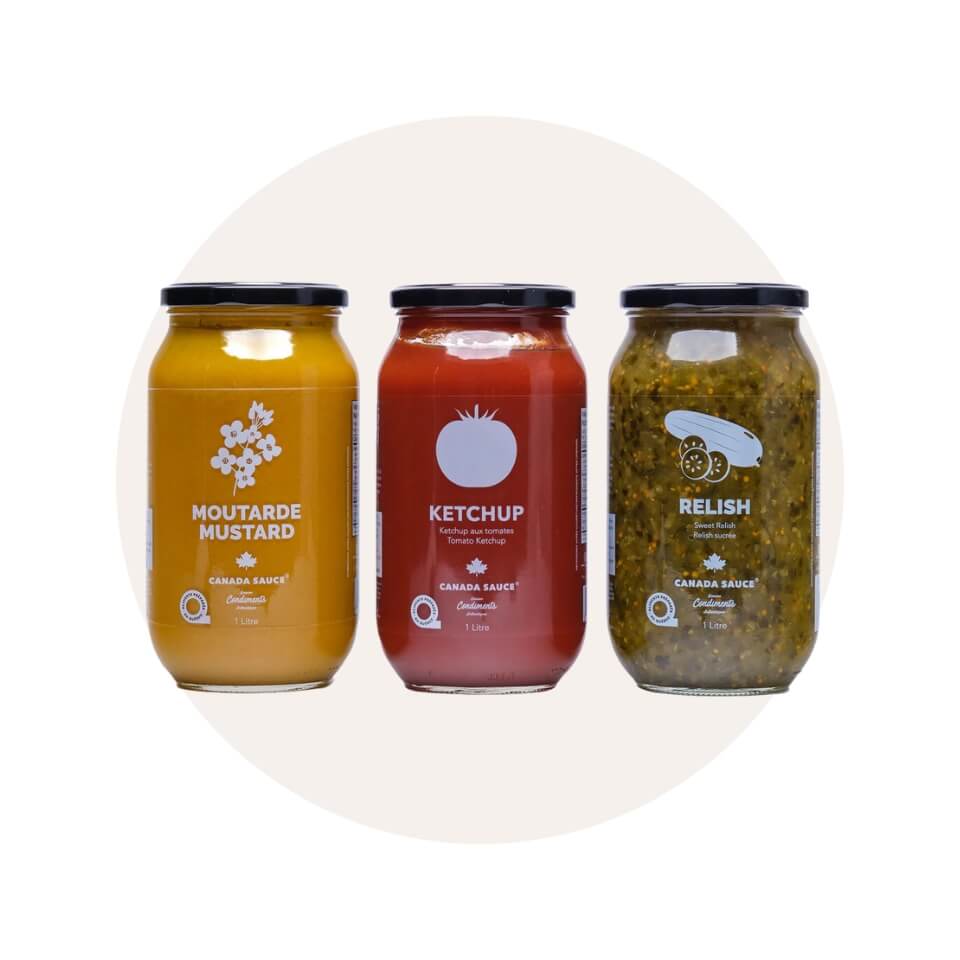 Three jars of sauce over a cream-coloured circle