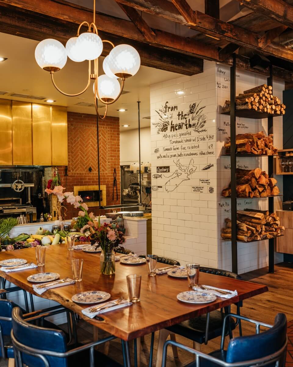 A view of shelves and a table in a restaurant