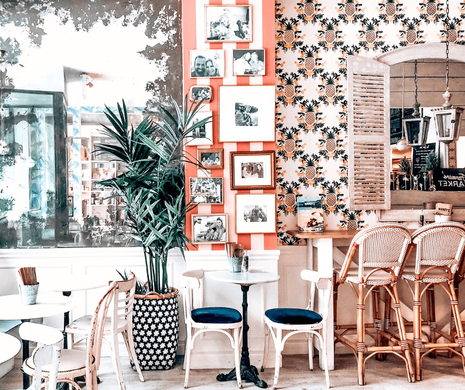 interior of restaurant with bistro chairs and bar