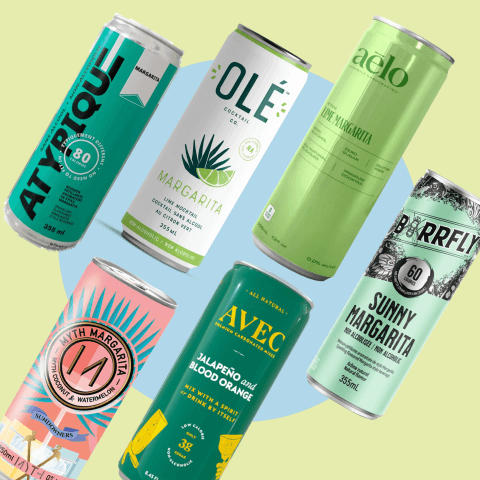 6 cans of beverage on blue circle background