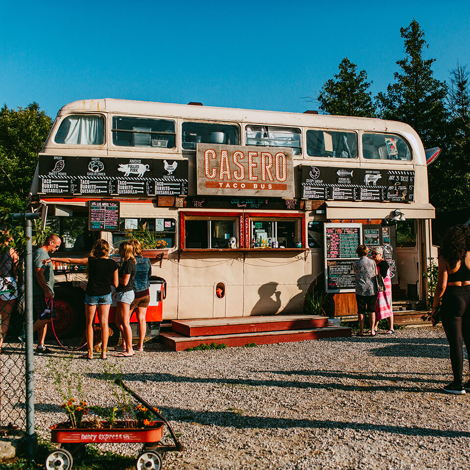 A restored double decker bus turned into a taco restaurant