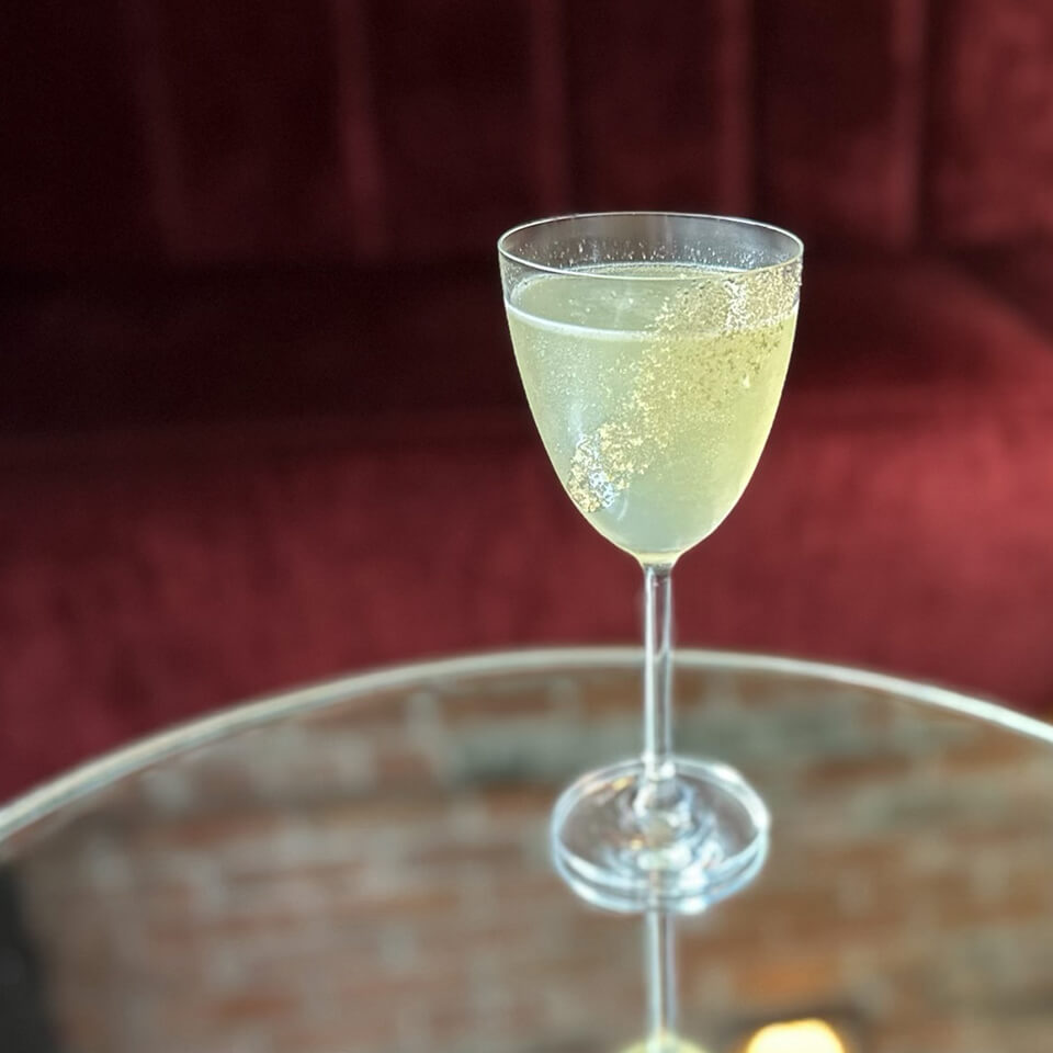 A sidecar cocktail on a table