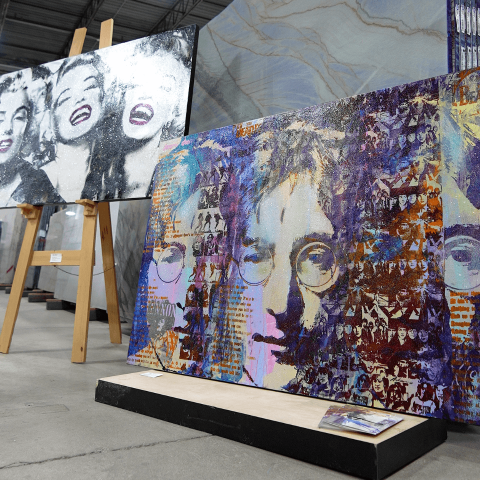 Easels with artwork depicting celebrities
