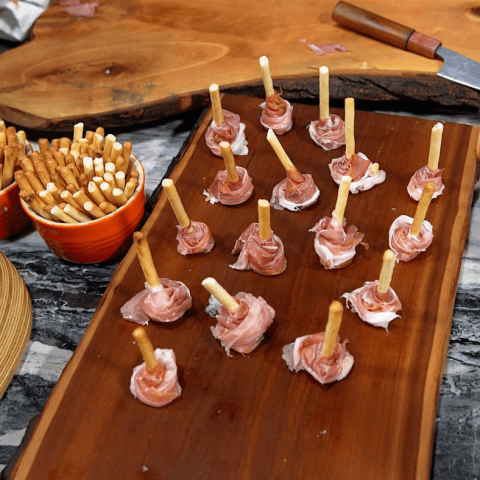 cutting board of prosciutto appetizers